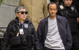 Ishii, de chaleco antibalas y lentes oscuros, se hizo famoso en fotos y videos junto a políticos, empresarios y jerarcas de Petrobras arrestados por corrupción